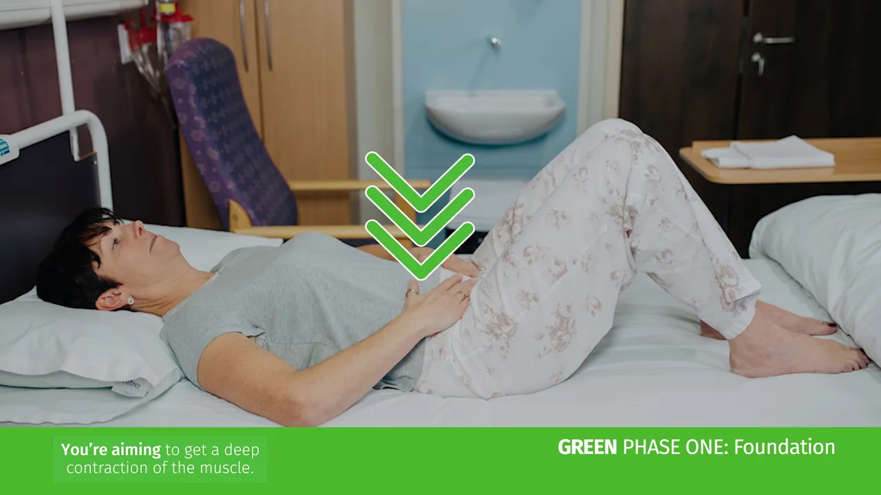 a woman lying in a hospital bed