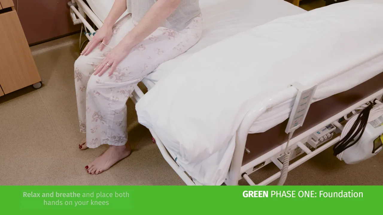 a person sitting on a hospital bed